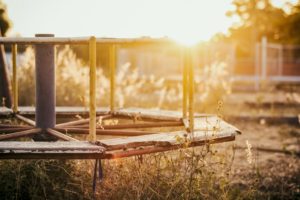 brown metal playground during golden hour