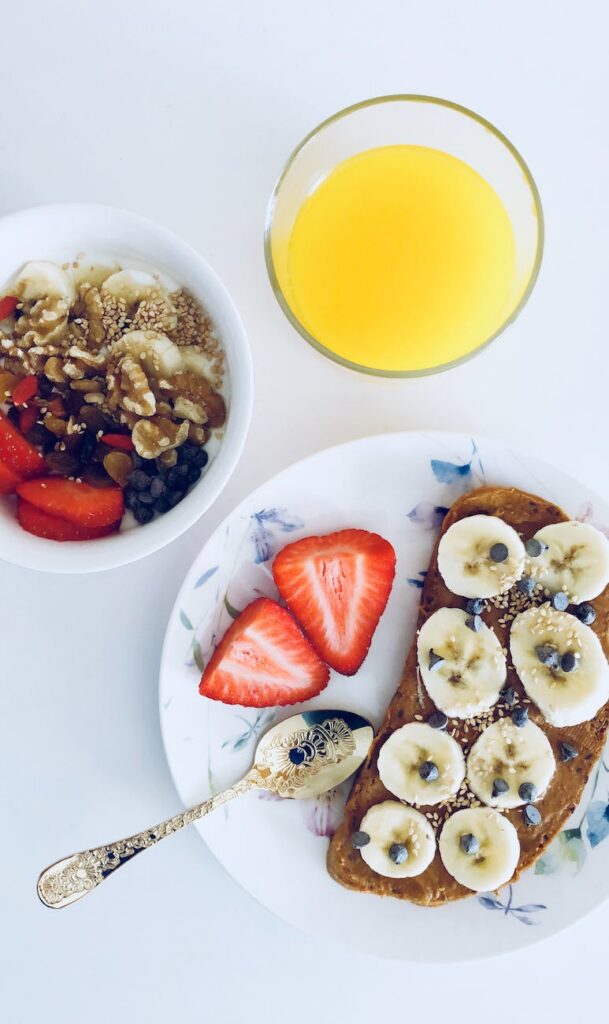 flatlay photography of bread and fruits